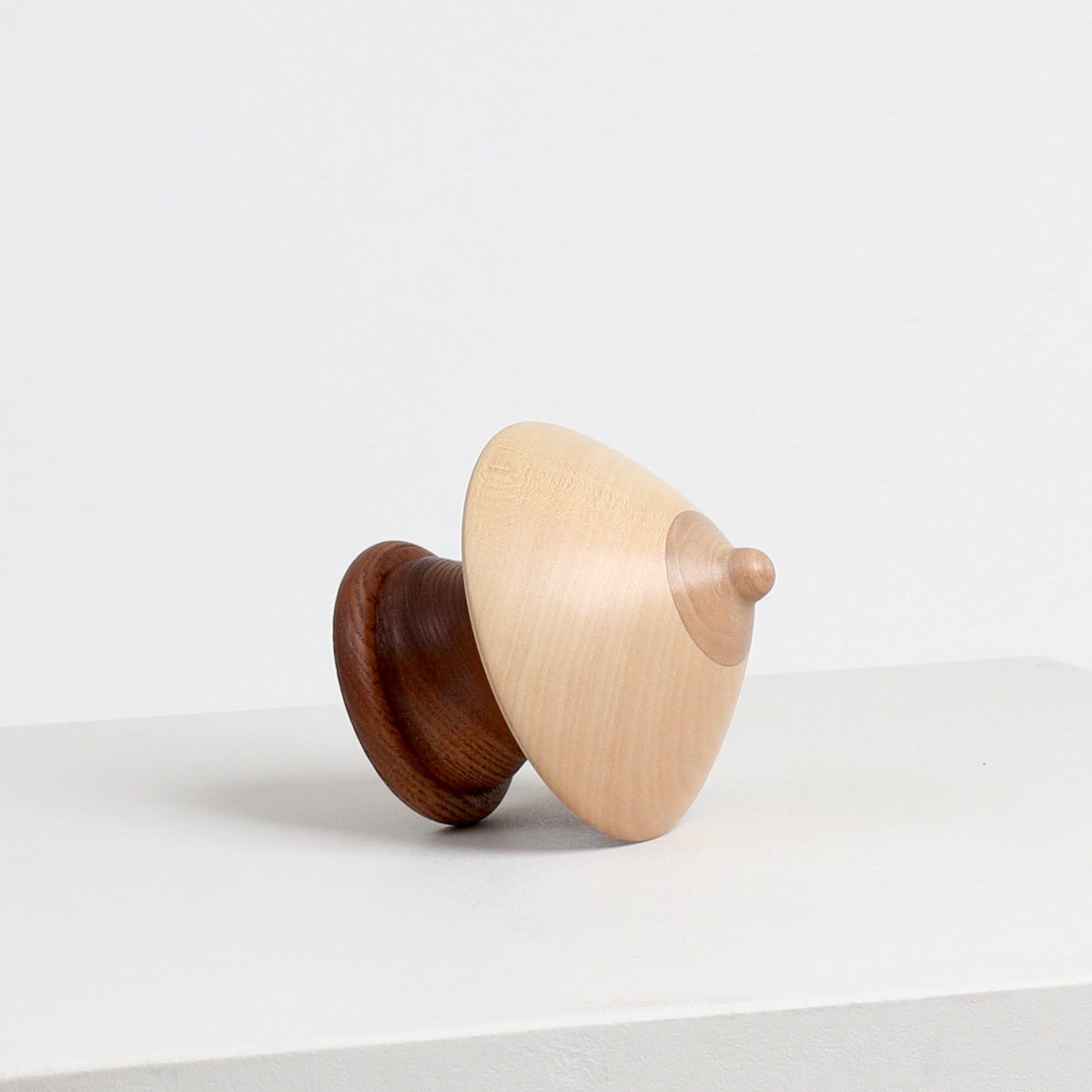 Wood Boob Coat Hook 05 by Micaella Pedros, a sculptural wall hook handcrafted from reclaimed wood offcuts.