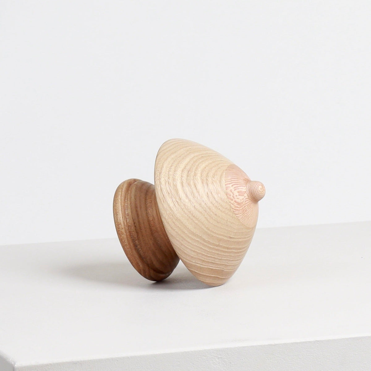 Wood Boob Coat Hook 04 by Micaella Pedros, a sculptural wall hook handcrafted from reclaimed wood offcuts.