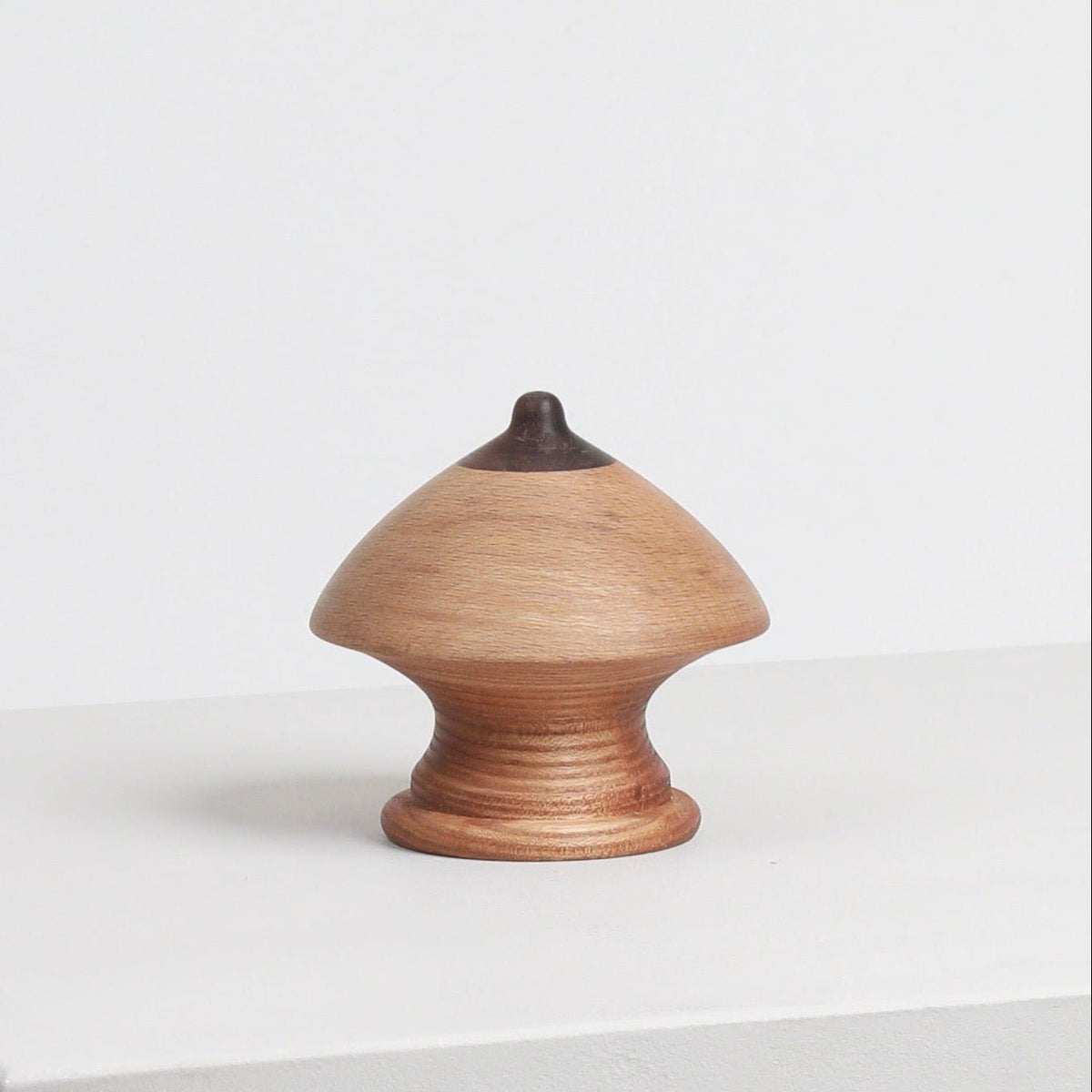 Wood Boob Coat Hook 03 by Micaella Pedros, a sculptural wall hook handcrafted from reclaimed wood offcuts.