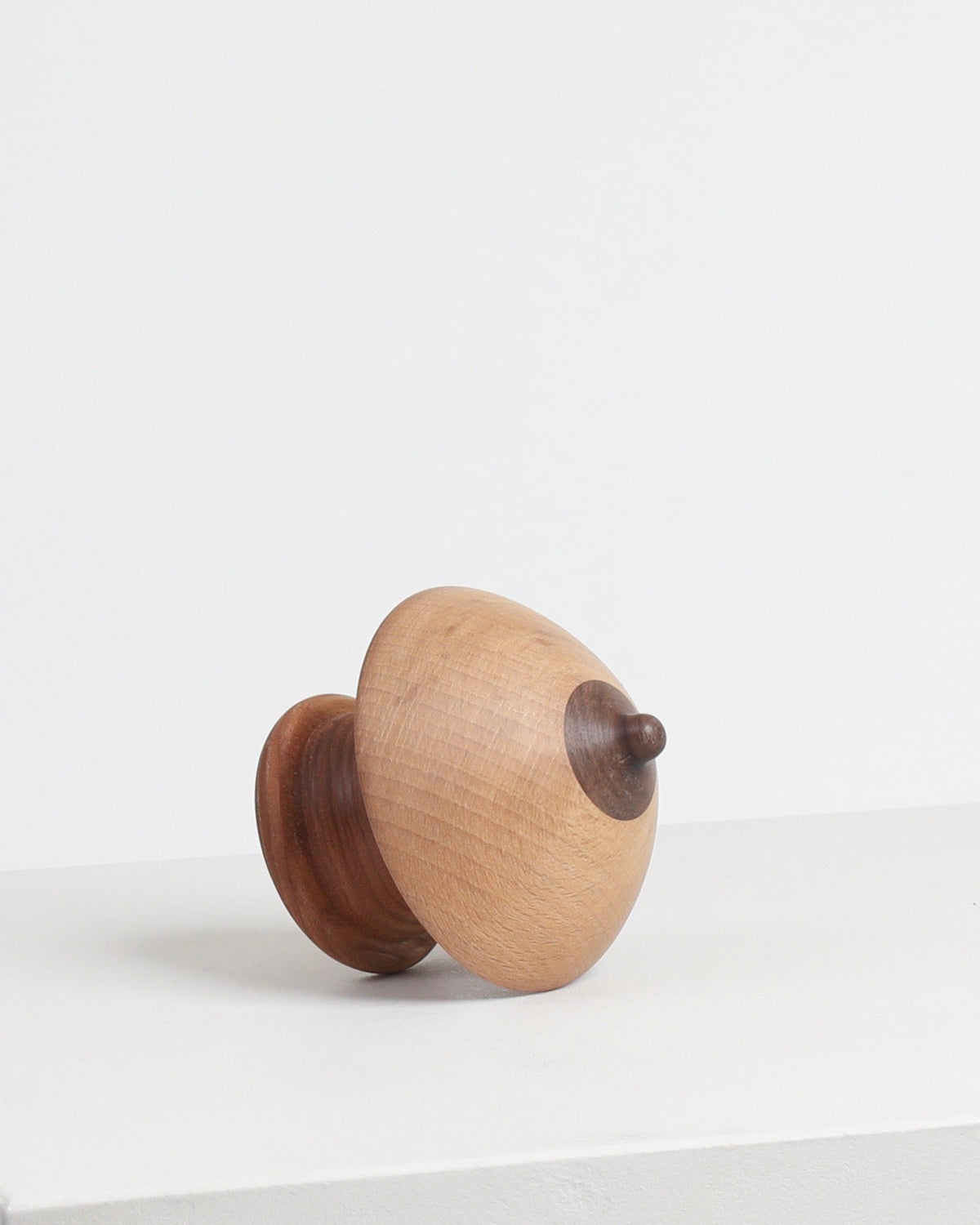 Wood Boob Coat Hook 03 by Micaella Pedros, a sculptural wall hook handcrafted from reclaimed wood offcuts.