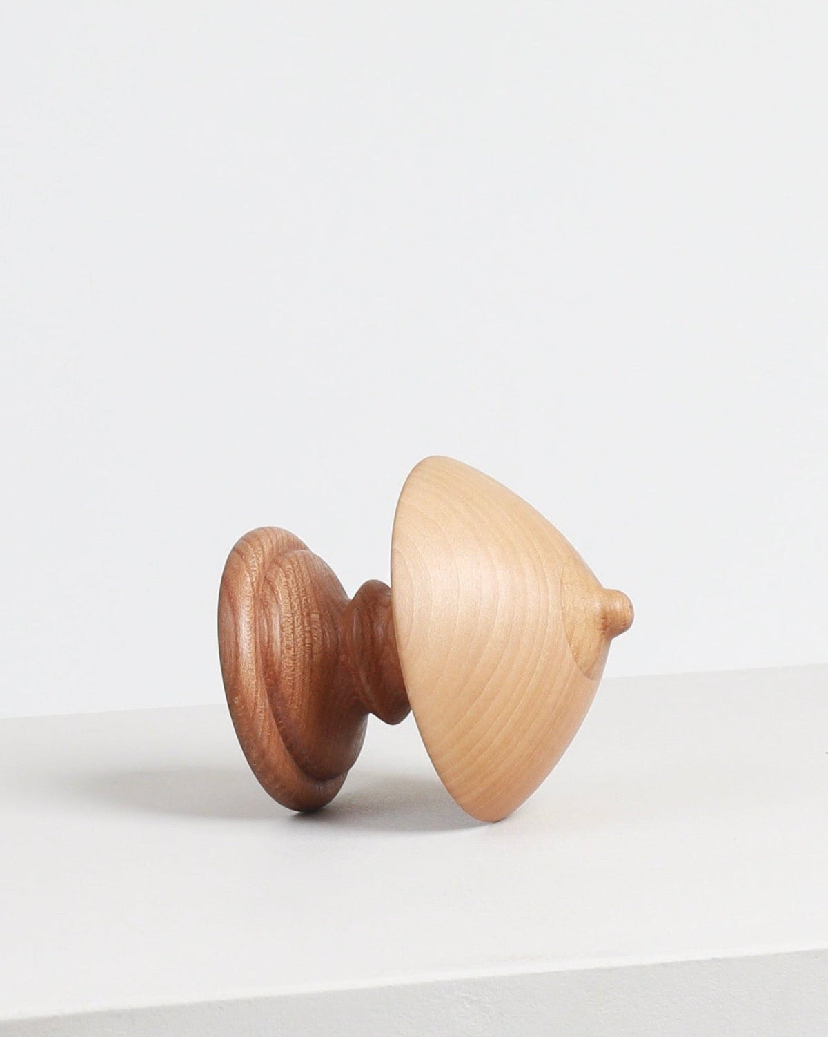 Wood Boob Coat Hook 02 by Micaella Pedros, a sculptural wall hook handcrafted from reclaimed wood offcuts.