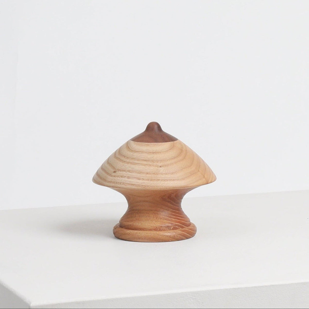 Wood Boob Coat Hook 09 by Micaella Pedros, a sculptural wall hook handcrafted from reclaimed wood offcuts.