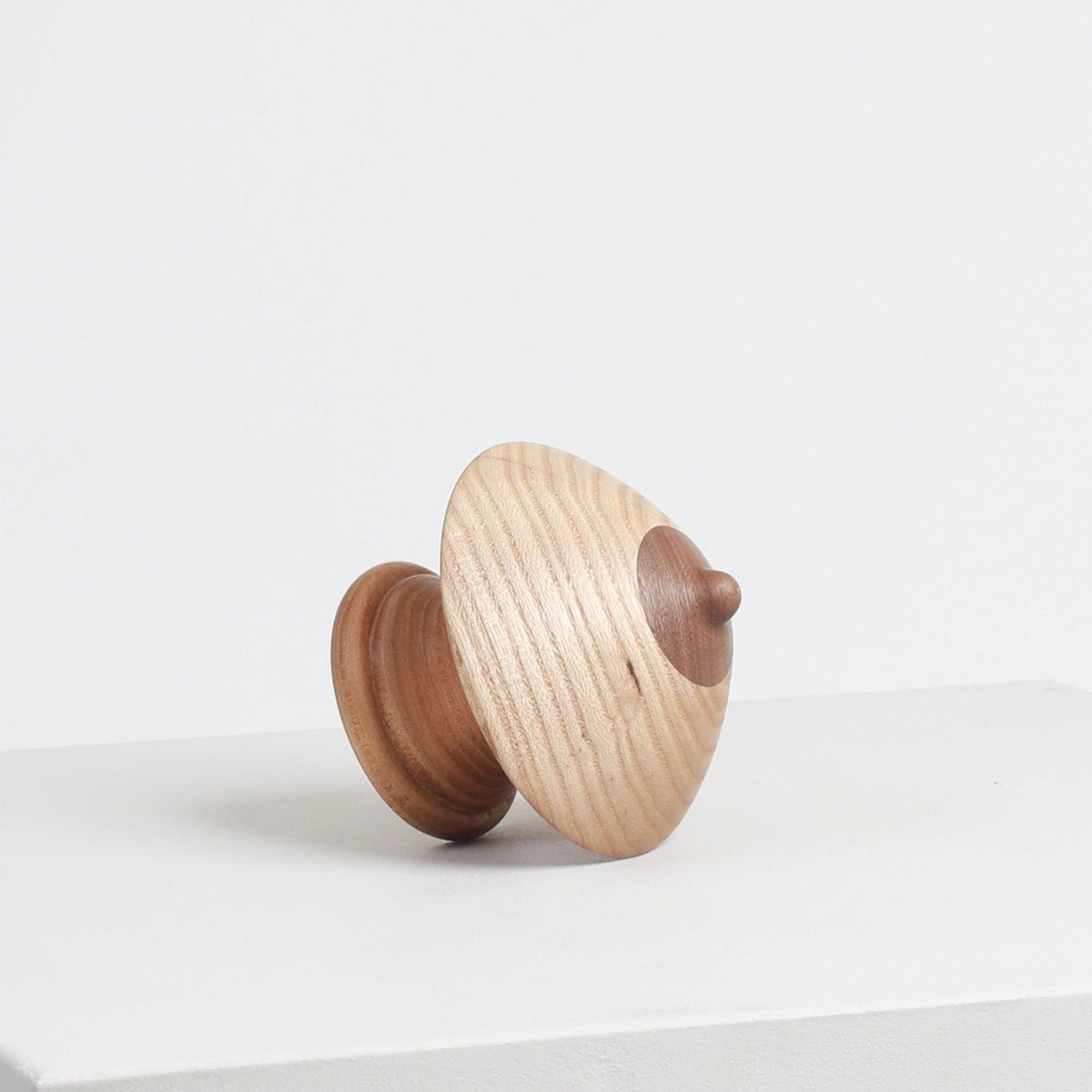 Wood Boob Coat Hook 09 by Micaella Pedros, a sculptural wall hook handcrafted from reclaimed wood offcuts.